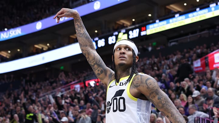 Feb 1, 2024; Salt Lake City, Utah, USA; Utah Jazz guard Jordan Clarkson (00) holds his follow through against Philadelphia. 