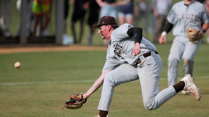 Elk City's Kash Mayfield chases down the ball in the third inning of a class 4A baseball state tournament game between Tuttle and Elk City in Edmond, Okla., Friday, May 12, 2023.