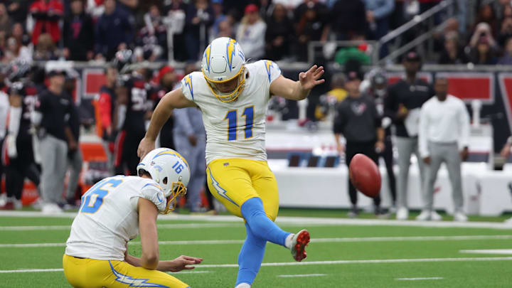 Jan 11, 2025; Houston, Texas, USA; Los Angeles Chargers punter Cameron Dicker (11) completes a 31 yard field goal in the first quarter against the Houston Texans in an AFC wild card game at NRG Stadium. Mandatory Credit: Thomas Shea-Imagn Images Jan 11, 2025; Houston, Texas, USA; Los Angeles Chargers punter Cameron Dicker (11) completes a 31 yard field goal in the first quarter against the Houston Texans in an AFC wild card game at NRG Stadium. Mandatory Credit: Thomas Shea-Imagn Images