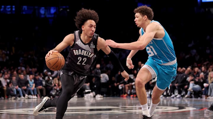 Feb 10, 2025; Brooklyn, New York, USA; Brooklyn Nets forward Jalen Wilson (22) drives to the basket against Charlotte Hornets forward Tidjane Salaun (31) during the fourth quarter at Barclays Center. Mandatory Credit: Brad Penner-Imagn Images