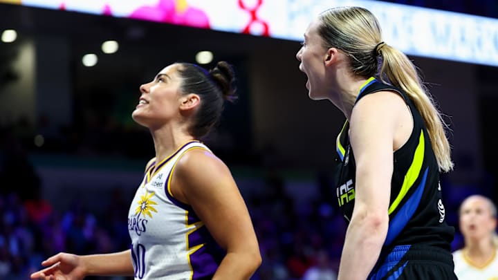 Aug 15, 2025; Arlington, Texas, USA; Dallas Wings guard Paige Bueckers (5) yells at Los Angeles Sparks guard Kelsey Plum (10) after scoring during the second half at College Park Center. Mandatory Credit: Kevin Jairaj-Imagn Images Aug 15, 2025; Arlington, Texas, USA; Dallas Wings guard Paige Bueckers (5) yells at Los Angeles Sparks guard Kelsey Plum (10) after scoring during the second half at College Park Center. Mandatory Credit: Kevin Jairaj-Imagn Images