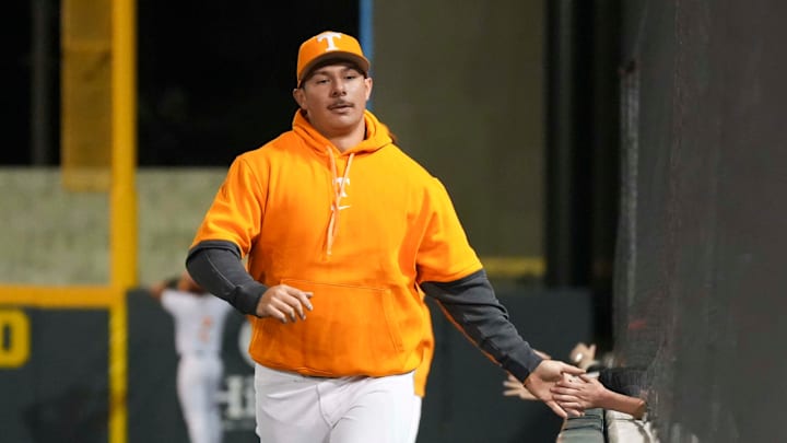 Tennessee first baseman Alberto Osuna (45) high-fives fans during a NCAA baseball game between Tennessee and St. Bonaventure at Lindsey Nelson Stadium on Friday, March 6, 2025.