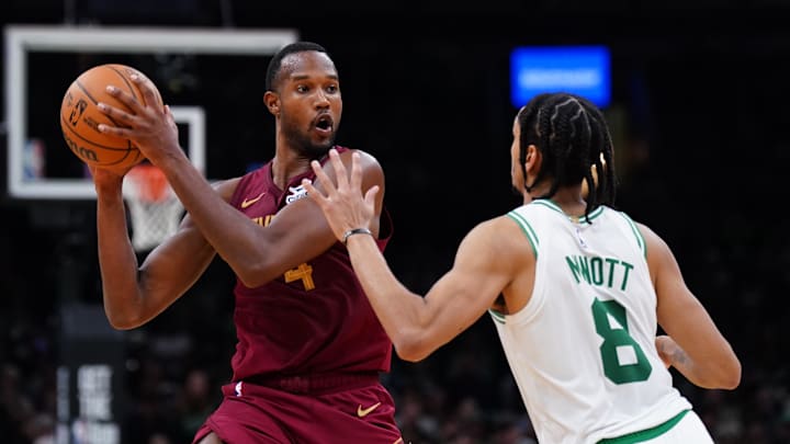 Oct 29, 2025; Boston, Massachusetts, USA; Cleveland Cavaliers center Evan Mobley (4) looks for an opening against Boston Celtics forward Josh Minott (8) in the second half at TD Garden. Mandatory Credit: David Butler II-Imagn Images Oct 29, 2025; Boston, Massachusetts, USA; Cleveland Cavaliers center Evan Mobley (4) looks for an opening against Boston Celtics forward Josh Minott (8) in the second half at TD Garden. Mandatory Credit: David Butler II-Imagn Images