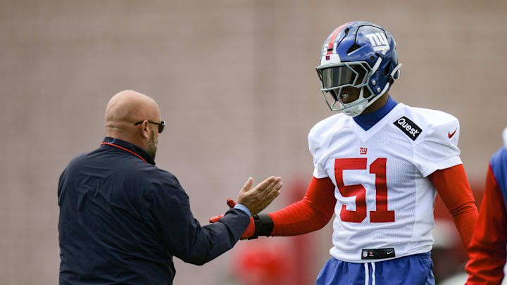 May 10, 2025; East Rutherford, NJ, USA; New York Giants head coach Brian Daboll greets linebacker Abdul Carter (51) 