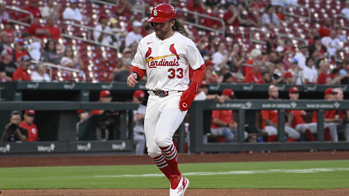 Sep 16, 2025; St. Louis, Missouri, USA; St. Louis Cardinals second baseman Brendan Donovan (33) crosses home plate for a run against the Cincinnati Reds in the first inning at Busch Stadium. Mandatory Credit: Joe Puetz-Imagn Images