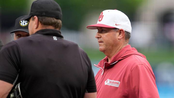 Oklahoma coach Skip Johnson talks with officials before a Bedlam baseball game between the Oklahoma State Cowboys and the Oklahoma Sooners at ONEOK Field in Tulsa, Okla., Tuesday, April 14, 2026. Oklahoma coach Skip Johnson talks with officials before a Bedlam baseball game between the Oklahoma State Cowboys and the Oklahoma Sooners at ONEOK Field in Tulsa, Okla., Tuesday, April 14, 2026.
