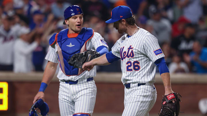 Aug 27, 2025; New York City, New York, USA; New York Mets starting pitcher Nolan McLean (26) fist bumps catcher Hayden Senger (30) after the bottom of the eighth inning against the Philadelphia Phillies at Citi Field. Mandatory Credit: Vincent Carchietta-Imagn Images