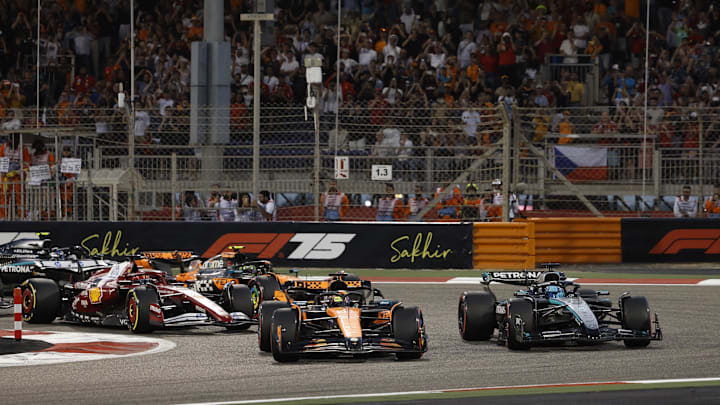 [US, Mexico & Canada customers only] April 13, 2025; Sakhir, BAHRAIN; Oscar Piastri leads George Russell into the first corner at the start of the race during the F1 Bahrain Grand Prix at the Bahrain International Circuit. Mandatory Credit: Rula Rouhana/Reuters via Imagn Images