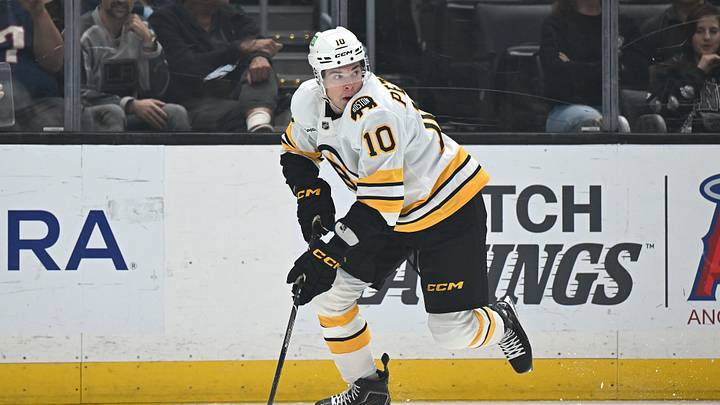 Oct 17, 2026; Los Angeles, California, USA; Boston Bruins right wing JJ Peterka (10) skates with the puck against against the Los Angeles Kings during the first period at Crypto.com Arena. Mandatory Credit: Griffin Hooper-Imagn Images Oct 17, 2026; Los Angeles, California, USA; Boston Bruins right wing JJ Peterka (10) skates with the puck against against the Los Angeles Kings during the first period at Crypto.com Arena. Mandatory Credit: Griffin Hooper-Imagn Images