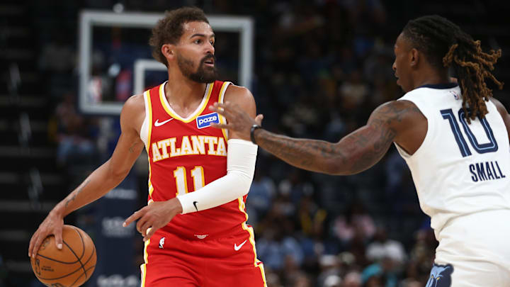 Oct 11, 2025; Memphis, Tennessee, USA; Atlanta Hawks guard Trae Young (11) dribbles as Memphis Grizzlies guard Javon Small (10) defends during the second quarter at FedExForum. Mandatory Credit: Petre Thomas-Imagn Images Oct 11, 2025; Memphis, Tennessee, USA; Atlanta Hawks guard Trae Young (11) dribbles as Memphis Grizzlies guard Javon Small (10) defends during the second quarter at FedExForum. Mandatory Credit: Petre Thomas-Imagn Images