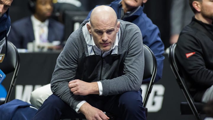 Penn State wrestling coach Cael Sanderson watches a match during the 2023 NCAA Wrestling Championships.