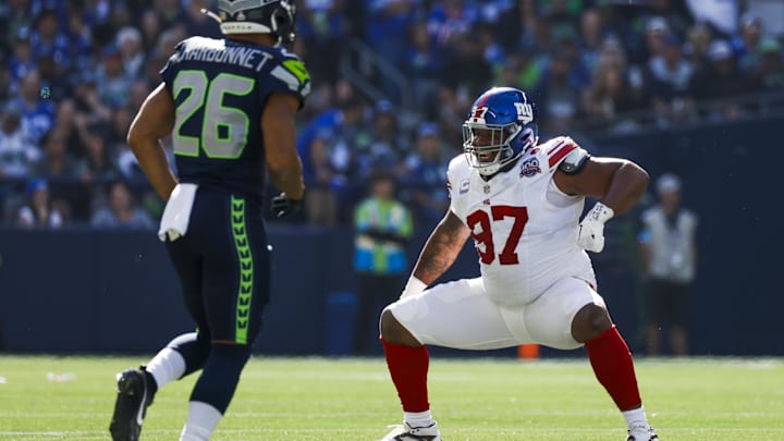 Oct 6, 2024; Seattle, Washington, USA; New York Giants defensive tackle Dexter Lawrence II (97) celebrates following a sack against the Seattle Seahawks during the second quarter at Lumen Field. Mandatory Credit: Joe Nicholson-Imagn Images