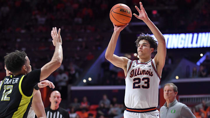 Mar 3, 2026; Champaign, Illinois, USA;  Illinois Fighting Illini guard Keaton Wagler (23) shoots the ball during the first half against the Oregon Ducks at State Farm Center. Mandatory Credit: Ron Johnson-Imagn Images