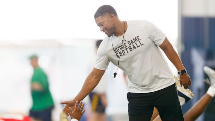 Notre Dame head coach Marcus Freeman greets his players during a football practice at Irish Athletic Center on Thursday, July 31, 2025, in South Bend.