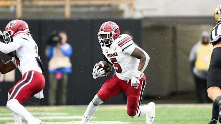 Nov 9, 2024; Nashville, Tennessee, USA;  South Carolina Gamecocks running back Raheim Sanders (5) runs the ball against the Vanderbilt Commodores during the first half at FirstBank Stadium. Mandatory Credit: Steve Roberts-Imagn Images