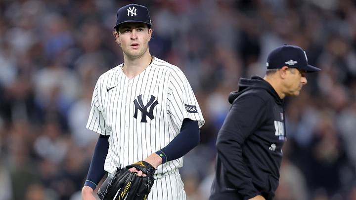 New York Yankees starting pitcher Cam Schlittler (31) reacts after being taken out of the game against the Boston Red Sox by manager Aaron Boone (17) during the seventh inning of game one of the Wildcard round of the 2026 MLB Playoffs at Yankee Stadium. New York Yankees starting pitcher Cam Schlittler (31) reacts after being taken out of the game against the Boston Red Sox by manager Aaron Boone (17) during the seventh inning of game one of the Wildcard round of the 2026 MLB Playoffs at Yankee Stadium.