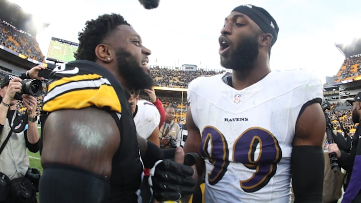 Nov 17, 2024; Pittsburgh, Pennsylvania, USA;  Pittsburgh Steelers linebacker Patrick Queen (6) and Baltimore Ravens linebacker Odafe Oweh (99) shake hands at mid-field after playing at Acrisure Stadium. Mandatory Credit: Charles LeClaire-Imagn Images