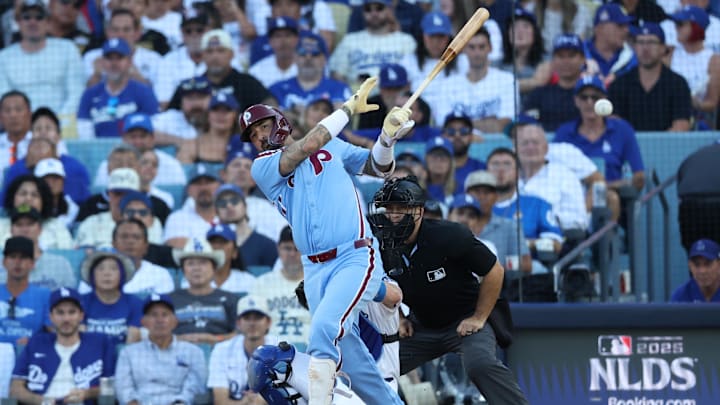 Oct 9, 2025; Los Angeles, California, USA; Philadelphia Phillies right fielder Nick Castellanos (8) hits a RBI double in the seventh inning against the Los Angeles Dodgers during game four of the NLDS round for the 2025 MLB playoffs at Dodger Stadium. Mandatory Credit: Kiyoshi Mio-Imagn Images Oct 9, 2025; Los Angeles, California, USA; Philadelphia Phillies right fielder Nick Castellanos (8) hits a RBI double in the seventh inning against the Los Angeles Dodgers during game four of the NLDS round for the 2025 MLB playoffs at Dodger Stadium. Mandatory Credit: Kiyoshi Mio-Imagn Images