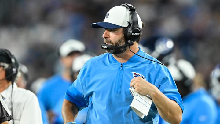Aug 22, 2025; Nashville, Tennessee, USA;  Tennessee Titans head coach Brian Callahan walks the sideline against the Minnesota Vikings during the first half at Nissan Stadium. Mandatory Credit: Steve Roberts-Imagn Images