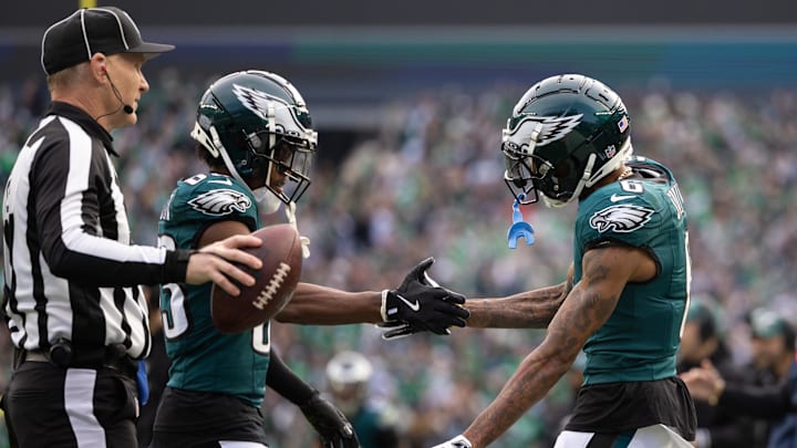 Dec 8, 2024; Philadelphia, Pennsylvania, USA;  Philadelphia Eagles wide receiver DeVonta Smith (6) celebrates his touchdown catch with wide receiver Jahan Dotson (83) during the second quarter against the Carolina Panthers at Lincoln Financial Field. Mandatory Credit: Bill Streicher-Imagn Images