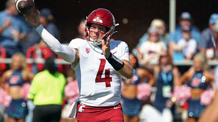 Oct 11, 2025; Oxford, Mississippi, USA; Washington State Cougars quarterback Zevi Eckhaus (4) passes the ball during the first quarter against the Mississippi Rebels at Vaught-Hemingway Stadium. Mandatory Credit: Petre Thomas-Imagn Images