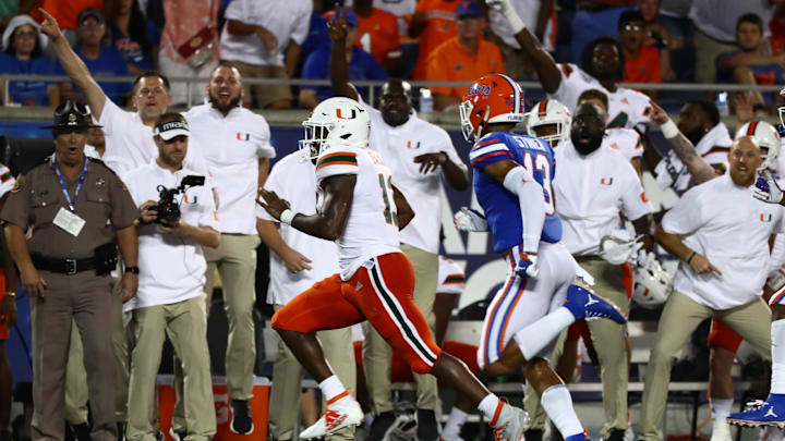 Aug 24, 2019; Orlando, FL, USA; Miami Hurricanes running back DeeJay Dallas (13) runs with the ball