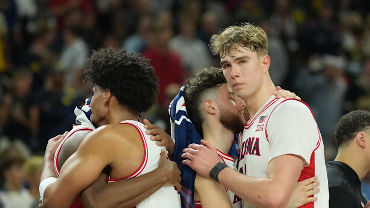 Apr 4, 2026; Indianapolis, IN, USA; Arizona Wildcats forward Koa Peat (10) and Arizona Wildcats center Motiejus Krivas (13) react in the second half during a semifinal of the Final Four of the men's 2026 NCAA Tournament against the Michigan Wolverines at Lucas Oil Stadium. Mandatory Credit: Robert Deutsch-Imagn Images Apr 4, 2026; Indianapolis, IN, USA; Arizona Wildcats forward Koa Peat (10) and Arizona Wildcats center Motiejus Krivas (13) react in the second half during a semifinal of the Final Four of the men's 2026 NCAA Tournament against the Michigan Wolverines at Lucas Oil Stadium. Mandatory Credit: Robert Deutsch-Imagn Images