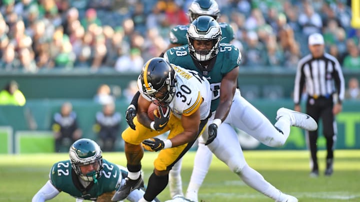Oct 30, 2022; Philadelphia, Pennsylvania, USA; Pittsburgh Steelers running back Jaylen Warren (30) is tackled by Philadelphia Eagles safety Marcus Epps (22) and  linebacker Kyron Johnson (58)  during the fourth quarter at Lincoln Financial Field. Mandatory Credit: Eric Hartline-Imagn Images