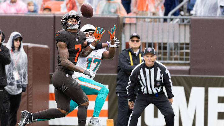 Oct 19, 2025; Cleveland, Ohio, USA;  Cleveland Browns cornerback Tyson Campbell (7) breaks up a pass intended for Miami Dolphins wide receiver Jaylen Waddle (17) during the second quarter at Huntington Bank Field. Mandatory Credit: Scott Galvin-Imagn Images