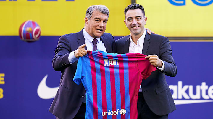 Joan Laporta y Xavi Hernández