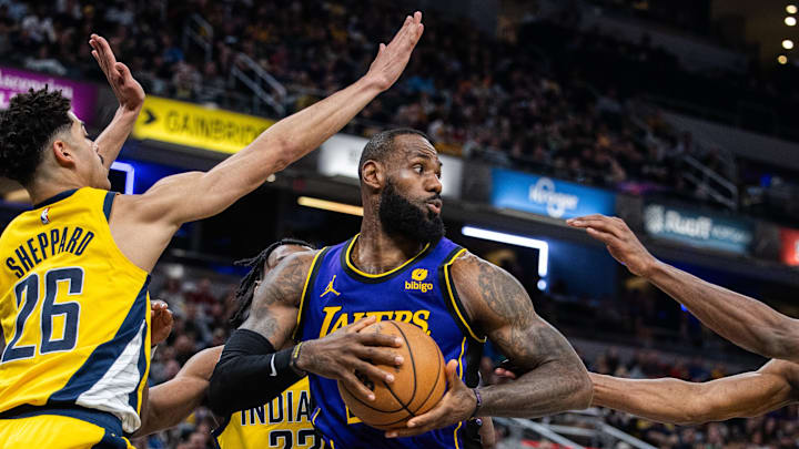 Mar 29, 2024; Indianapolis, Indiana, USA; Los Angeles Lakers forward LeBron James (23) holds the