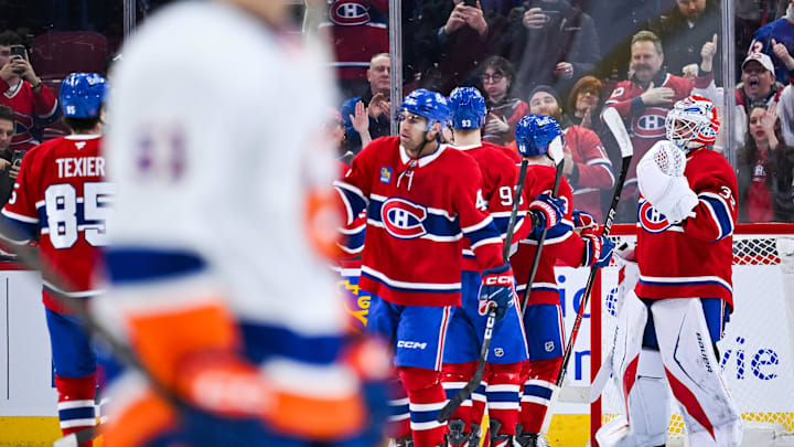 Mar 21, 2026; Montreal, Quebec, CAN; Montreal Canadiens players gather towards Montreal Canadiens goalie Jacob Fowler (32) to celebrate their win against the New York Islanders after the third period at Bell Centre. Mandatory Credit: David Kirouac-Imagn Images Mar 21, 2026; Montreal, Quebec, CAN; Montreal Canadiens players gather towards Montreal Canadiens goalie Jacob Fowler (32) to celebrate their win against the New York Islanders after the third period at Bell Centre. Mandatory Credit: David Kirouac-Imagn Images
