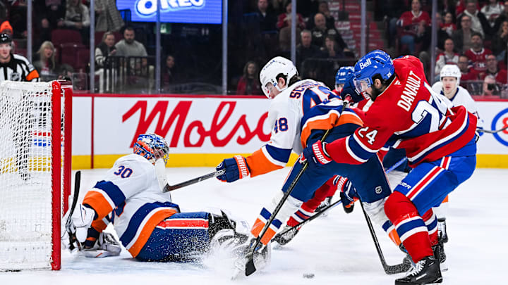 Mar 21, 2026; Montreal, Quebec, CAN; New York Islanders goalie Ilya Sorokin (30) makes a save against Montreal Canadiens center Phillip Danault (24) during the first period at Bell Centre. Mandatory Credit: David Kirouac-Imagn Images Mar 21, 2026; Montreal, Quebec, CAN; New York Islanders goalie Ilya Sorokin (30) makes a save against Montreal Canadiens center Phillip Danault (24) during the first period at Bell Centre. Mandatory Credit: David Kirouac-Imagn Images