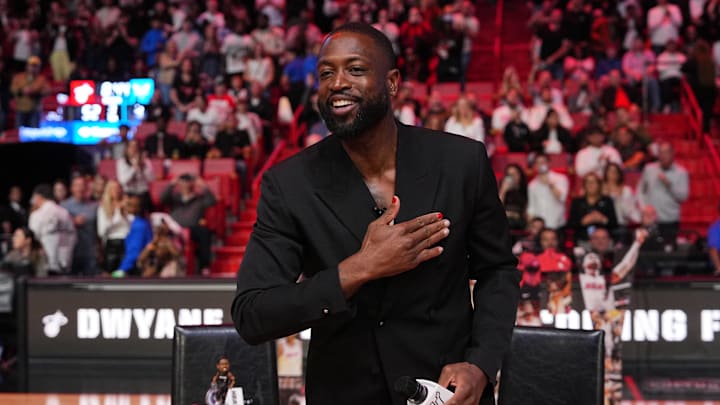 Jan 14, 2024; Miami, Florida, USA; Former Miami Heat player Dwayne Wade acknowledges the fans and