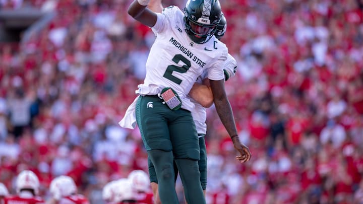 Oct 4, 2025; Lincoln, Nebraska, USA; Michigan State Spartans quarterback Aidan Chiles (2) celebrates after scoring a rushing touchdown during the game against Nebraska at Memorial Stadium. Mandatory Credit: Kylie Graham-Imagn Images