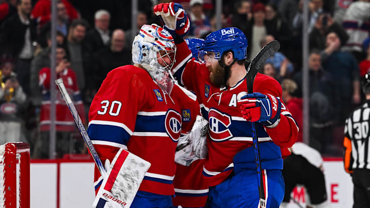 Feb 13, 2024; Montreal, Quebec, CAN; Montreal Canadiens defenseman David Savard (58) celebrates the