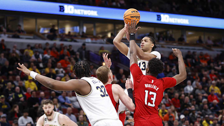 Mar 9, 2023; Chicago, IL, USA; Michigan Wolverines guard Jett Howard (13) shoots against the Rutgers