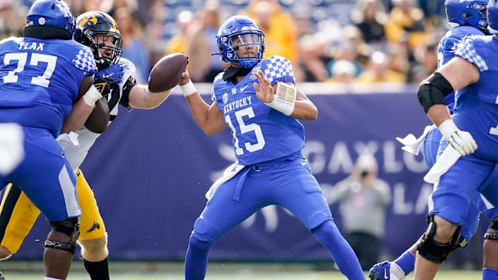 Kentucky quarterback Destin Wade (15) throws against Iowa during the first quarter of the TransPerfect Music City Bowl at Nissan Stadium in Nashville, Tenn., Saturday, Dec. 31, 2022.