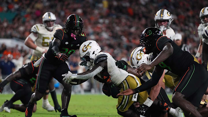 Oct 7, 2023; Miami Gardens, Florida, USA; Georgia Tech Yellow Jackets running back Jamal Haynes (11) runs the ball for a touchdown against the Miami Hurricanes in the second half at Hard Rock Stadium. Mandatory Credit: Jasen Vinlove-Imagn Images