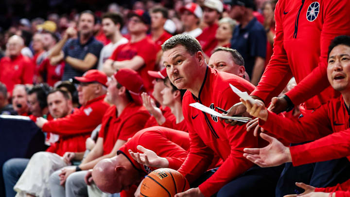 Feb 22, 2025; Tucson, Arizona, USA; Arizona Wildcats head coach Tommy Lloyd looks at the referee after BYU Cougars guard Trey Stewart (1) threw the ball at him by accident during the second half at McKale Center. Mandatory Credit: Aryanna Frank-Imagn Images