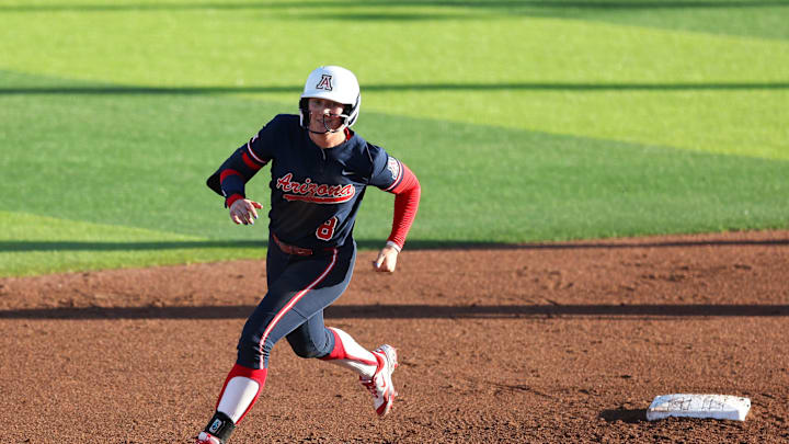 Arizona's Grace Jenkins (8) rounds second after a three-run homer during a Big 12 Conference softball game, Friday, March 13, 2026, at Rocky Johnson Field.