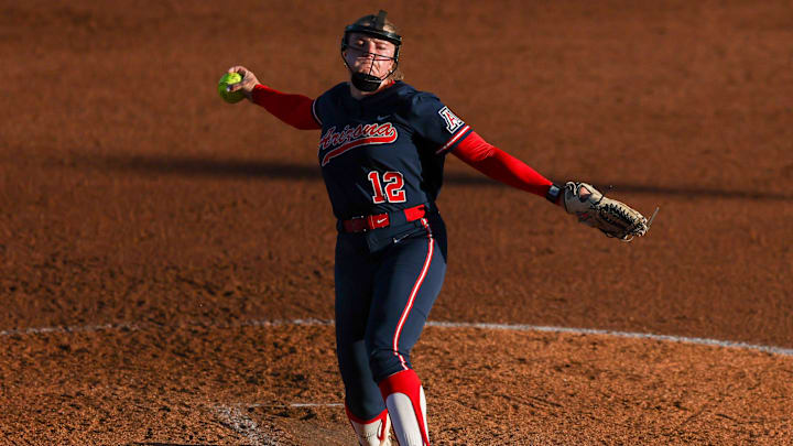 Arizona's Jalen Adams (12) pitches the ball during a Big 12 Conference softball game, Friday, March 13, 2026, at Rocky Johnson Field.
