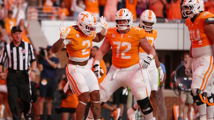 Oct 11, 2025; Knoxville, Tennessee, USA; Tennessee Volunteers running back Peyton Lewis (2) celebrates a touchdown against the Arkansas Razorbacks during the second half at Neyland Stadium. Mandatory Credit: Randy Sartin-Imagn Images
