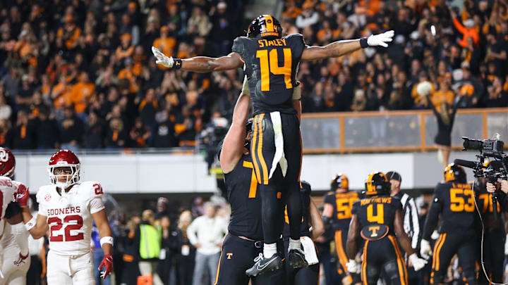 Nov 1, 2025; Knoxville, Tennessee, USA; Tennessee Volunteers wide receiver Braylon Staley (14) and offensive lineman Jesse Perry (72) celebrate a touchdown against the Oklahoma Sooners during the first quarter at Neyland Stadium. Mandatory Credit: Randy Sartin-Imagn Images Nov 1, 2025; Knoxville, Tennessee, USA; Tennessee Volunteers wide receiver Braylon Staley (14) and offensive lineman Jesse Perry (72) celebrate a touchdown against the Oklahoma Sooners during the first quarter at Neyland Stadium. Mandatory Credit: Randy Sartin-Imagn Images