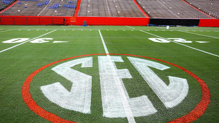 The SEC logo has a first coat of paint on the field at Ben Hill Griffin Stadium as the grounds crew prepares the field for the first game of the season, on the University of Florida campus in Gainesville FL. Sept. 1, 2022. The Gators start the season Saturday against the No. 7 ranked Utah Utes.

Flgai 090122 Ufpaintthefield 08