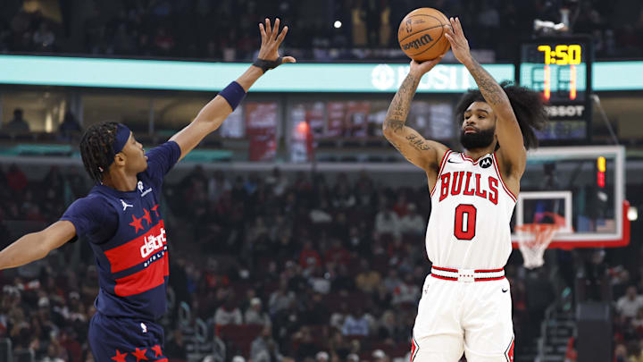 Jan 10, 2025; Chicago, Illinois, USA; Chicago Bulls guard Coby White (0) shoots