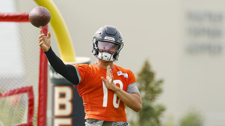 Jul 24, 2025; Lake Forest, IL, USA; Chicago Bears quarterback Caleb Williams (18) passes the ball during training camp at Halas Hall. Mandatory Credit: Kamil Krzaczynski-Imagn Images