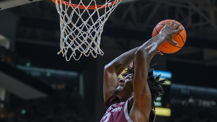Feb 24, 2024; Knoxville, Tennessee, USA; Texas A&M Aggies forward Solomon Washington (13) dunks