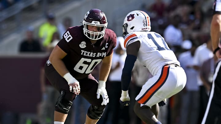 Sep 27, 2025; College Station, Texas, USA; Texas A&M Aggies offensive lineman Trey Zuhn III (60) lines up during the first half against the Auburn Tigers at Kyle Field. Mandatory Credit: Maria Lysaker-Imagn Images 