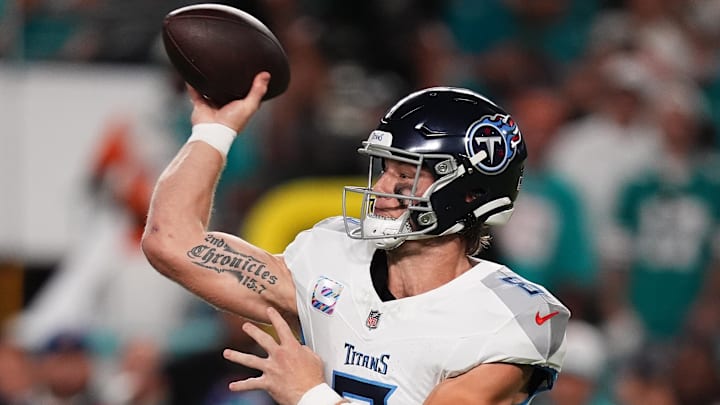 Sep 30, 2024; Miami Gardens, Florida, USA; Tennessee Titans quarterback Will Levis (8) attempts a pass under pressure from Miami Dolphins linebacker Jaelan Phillips (15) during the first half at Hard Rock Stadium. Mandatory Credit: Jasen Vinlove-Imagn Images